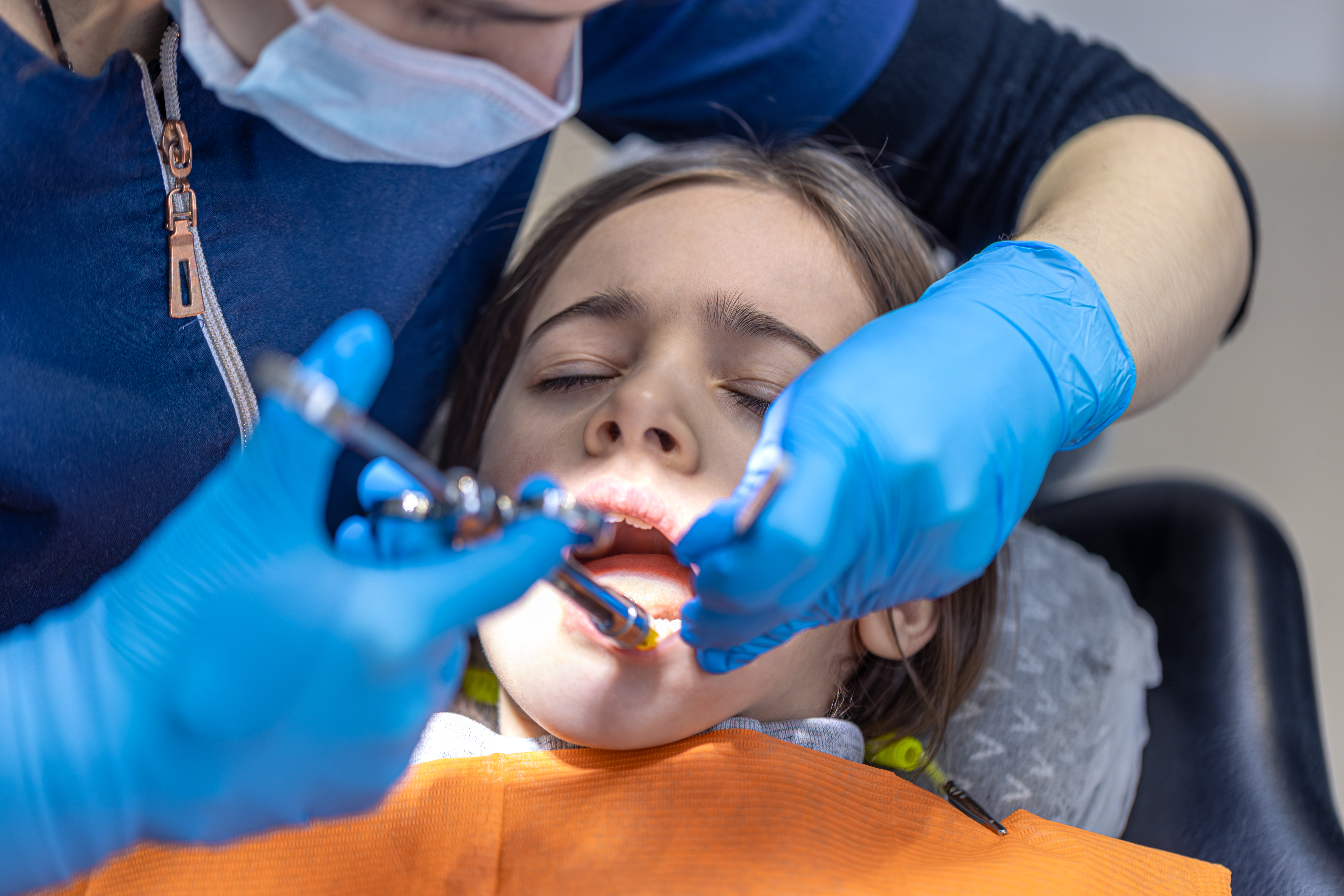 Child at dental clinic smiling